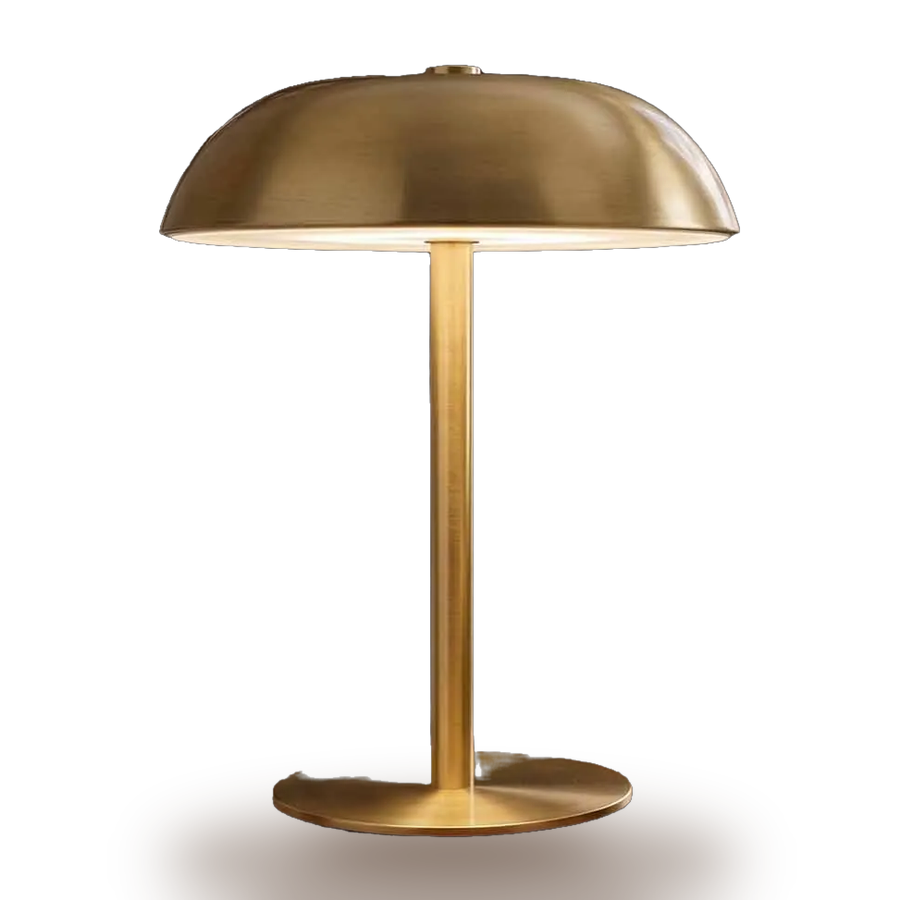 Nomad — a brushed brass dome on a slim stem and a round weighted base.